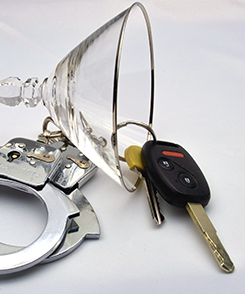 Drinking Glass, Car Keys and Handcuffs